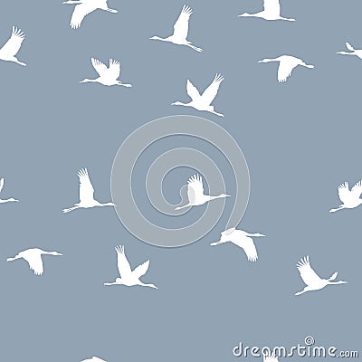 Seamless pattern with a flock of white cranes on a blue background. Vector Illustration
